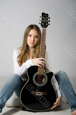 Wonderful girl with a guitar