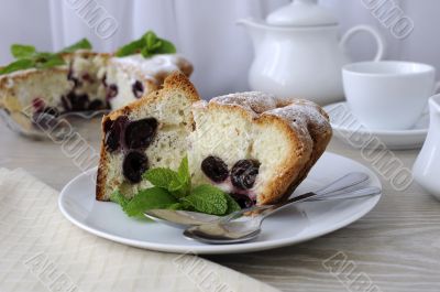 Pieces of sponge cake with cherries