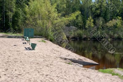 Beach on the shore of the pond.