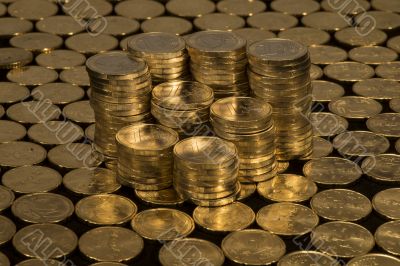 Coins of 1 Euro on a carpet of 20 cent