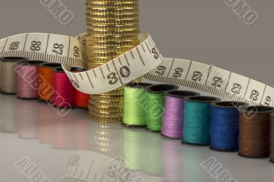 Tailoring costs represented by coins, threads and meters