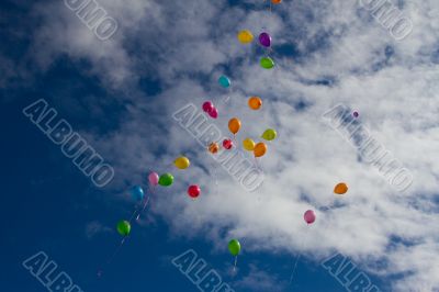 Lots of colorful balloons in the sky