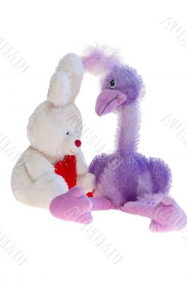 Toy teddy bear, ostrich and rabbit together.