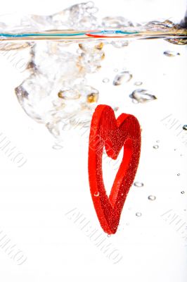 Valentine with red heart in water