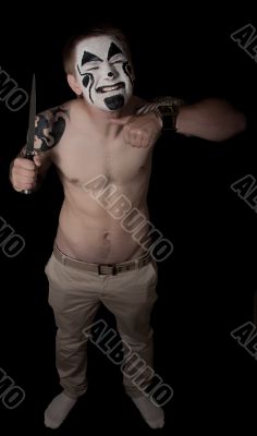 Evil clown with a knife Evil clown with a knife