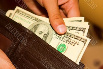 man gets money from her purse man gets money from her purse