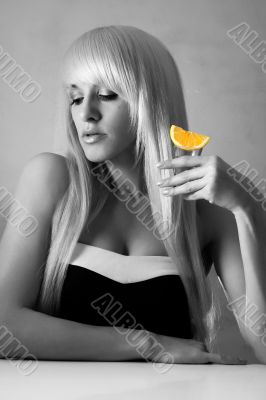 Beautiful blonde in a bar drinking tequila Beautiful blonde in a bar drinking tequila