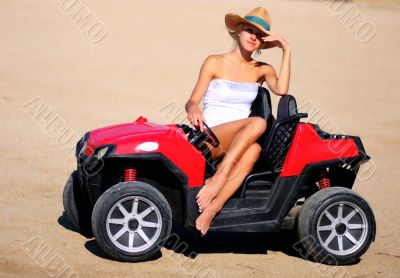 pretty girl in toy car