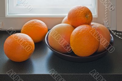 Oranges on the windowsill. Oranges on the windowsill.