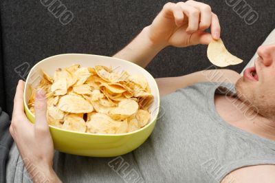 Man eating chips