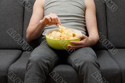 Man eating chips