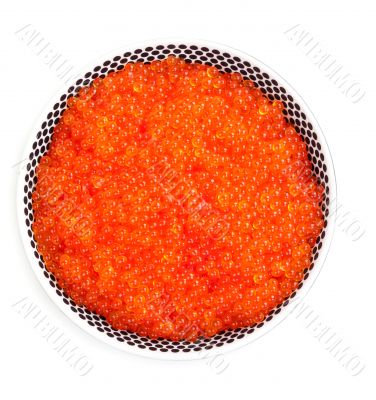 A plate full of fresh red caviar