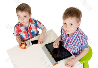 Two brothers with a Tablet PC
