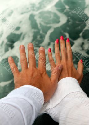 Men`s and Women`s tanned hands