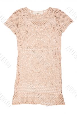 Knitted women`s dress in beige mesh