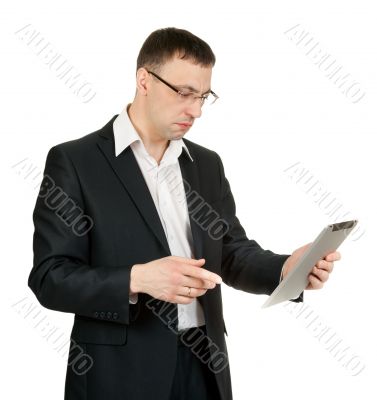 businessman with a tablet PC at a loss