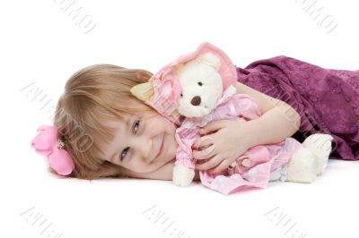 a little girl 4 years old with a plush toy bear