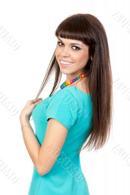 Beautiful young woman with long healthy dark hair on white backg