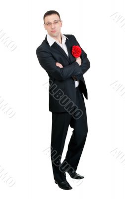 A man with a tango dancer in red fabric flower in his jacket poc