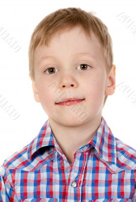 portrait of a boy in a plaid shirt