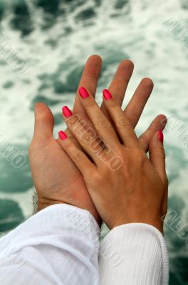 Men`s and Women`s tanned hands