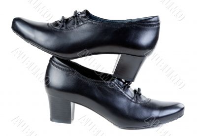 A pair of black women`s shoes