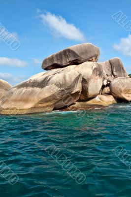 Rocks in the azure sea
