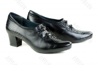 A pair of black women`s shoes