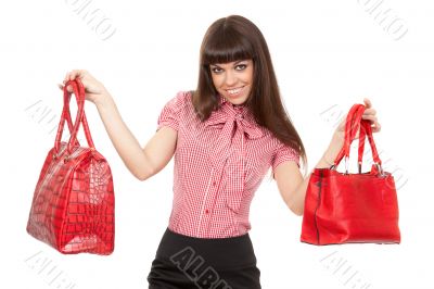 Portrait of a glamorous woman choosing bag