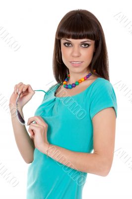 Portrait of a beautiful woman in blue dress and sunglasses in ha