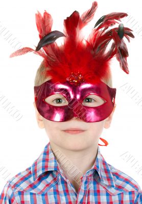 The Boy in the masquerade mask with feathers