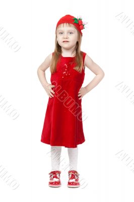 Charming little girl in red cap and gown in full growth