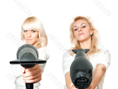 Blonde girl with hair dryer
