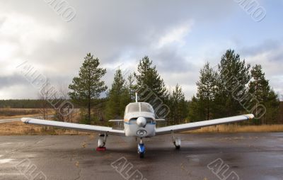 Small airplane parking - front view