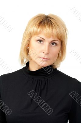 Portrait of a serious beautiful girl dressed in black