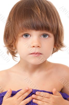 Portrait of a charming young girl close-up in the studio