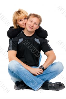 Beautiful couple in love sitting in the lotus position