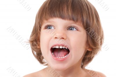 Studio portrait of a close-up of a girl with her mouth open with