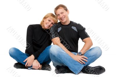 Beautiful couple in love sitting in the lotus position