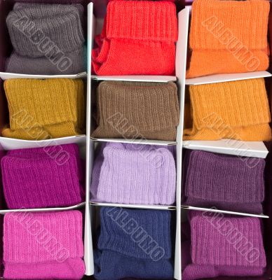 box of colored clothing