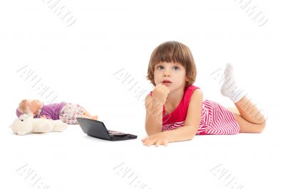 Little beautiful girl is playing with make-up