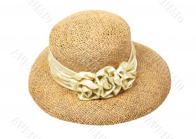 Women`s straw hat with a flower, isolated