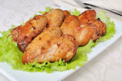 Baked chicken wings with garlic