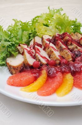 Sliced â€‹â€‹baked fillet with cranberry sauce