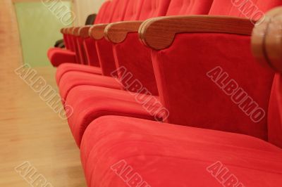 Background of red theatrical red chairs