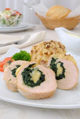 Chicken roulade stuffed with spinach and cheese