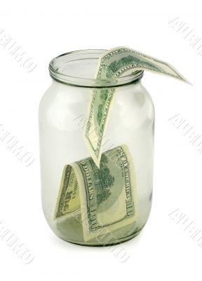 Glass jar of hundreds of dollars