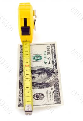 measure tape on hundred dollar