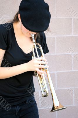 Female jazz trumpet player.