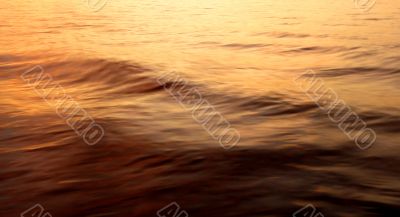Waves on the sea at dusk background